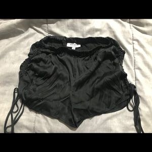 Black Frankie’s scrunched swim shorts. Size S